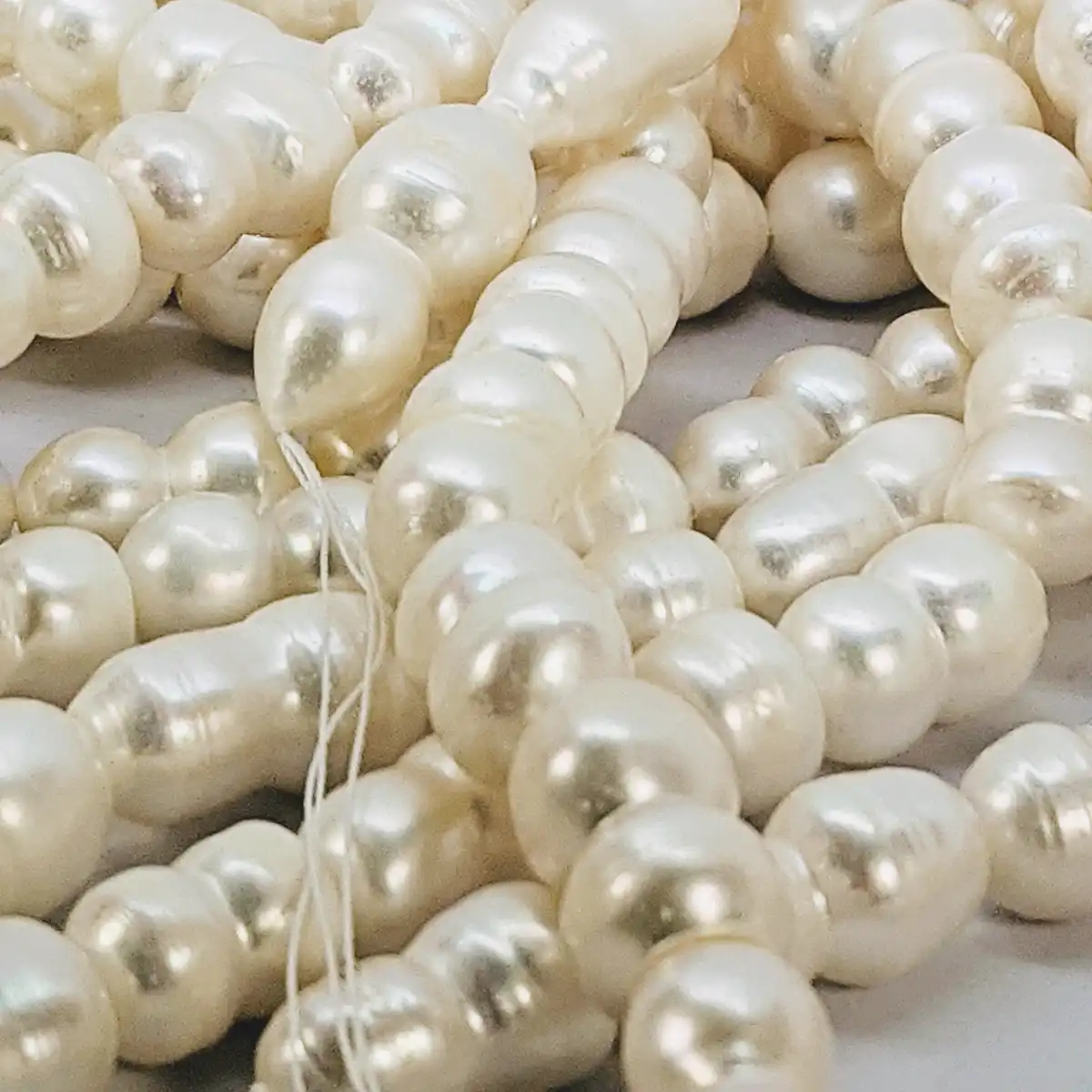 Large Freshwater Peanut Shaped Pearls - Loose String - Image 3