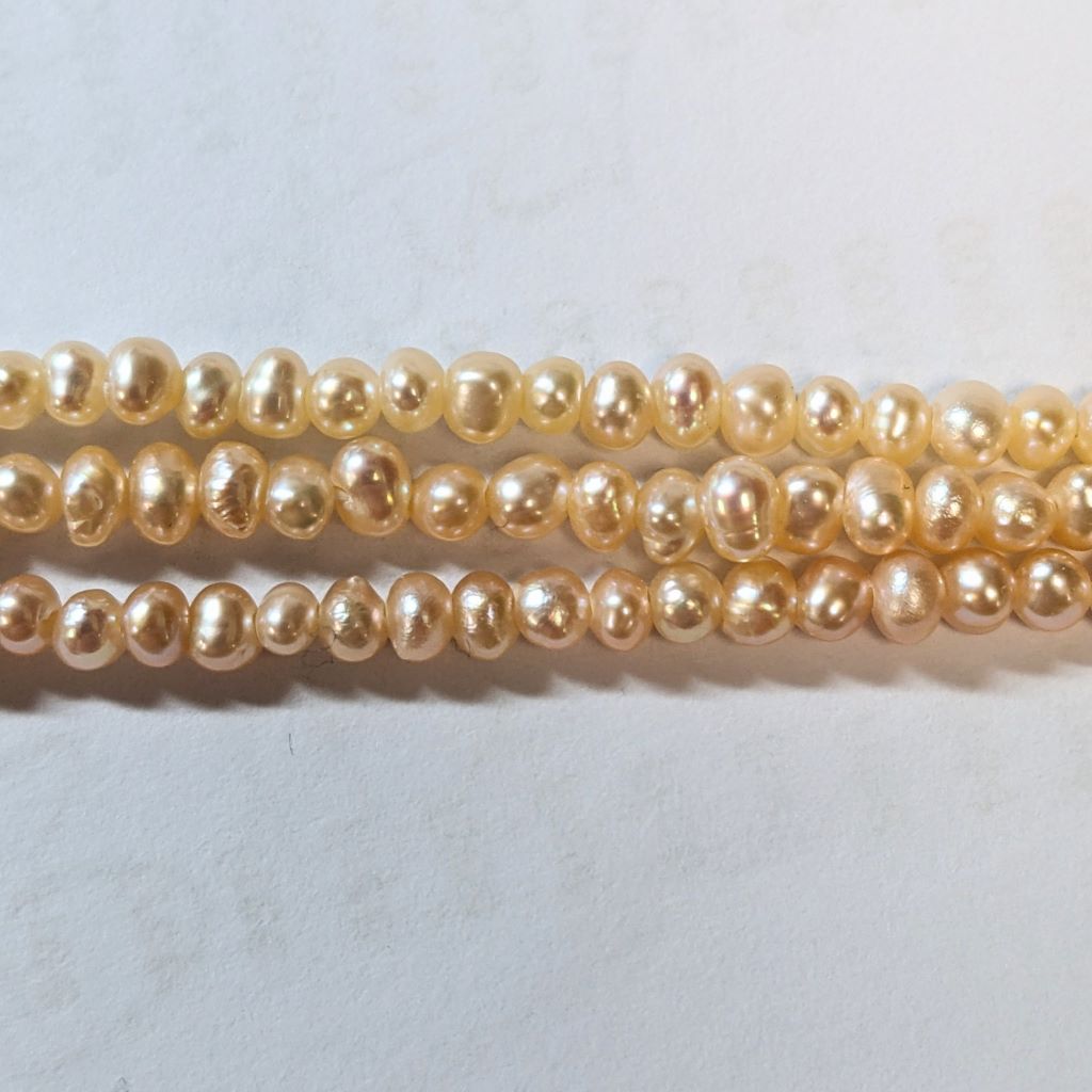 2.5-3mm Semi Round Seed Pearl, loose string, Peach - Image 2