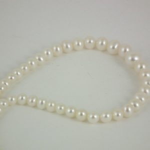Alternative view of Graduated AA Freshwater Semi-round Pearls 4-8mm - White