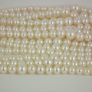Graduated AA Freshwater Semi-round Pearls 4-8mm - White