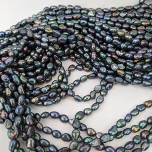 Peacock Black Freshwater Baroque Rice Pearl String 6 x 9 mm