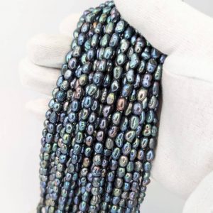 Alternative view of Baroque Rice Pearl String, Peacock Black 5 x 7 mm