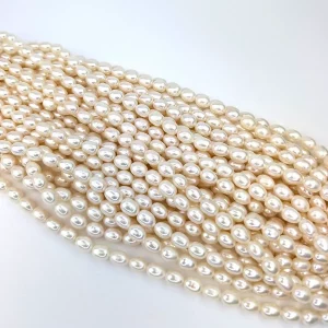 Alternative view of AA Rice Pearls - Freshwater white pearl string 6.5-7.5mm