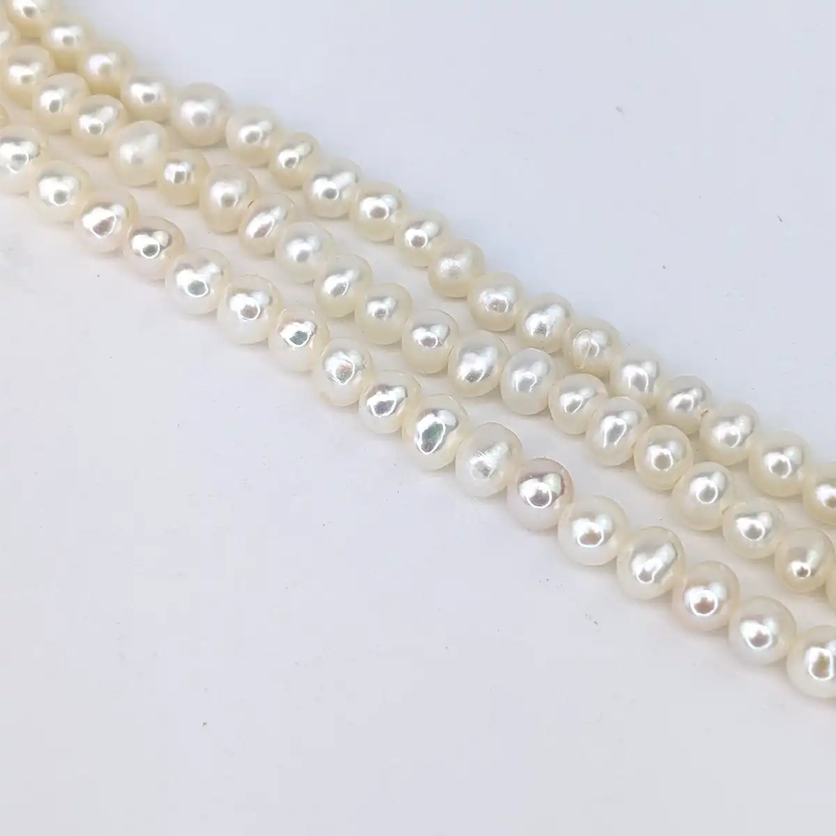 Near Round Pearl String - Freshwater 4.5-5mm - Image 4