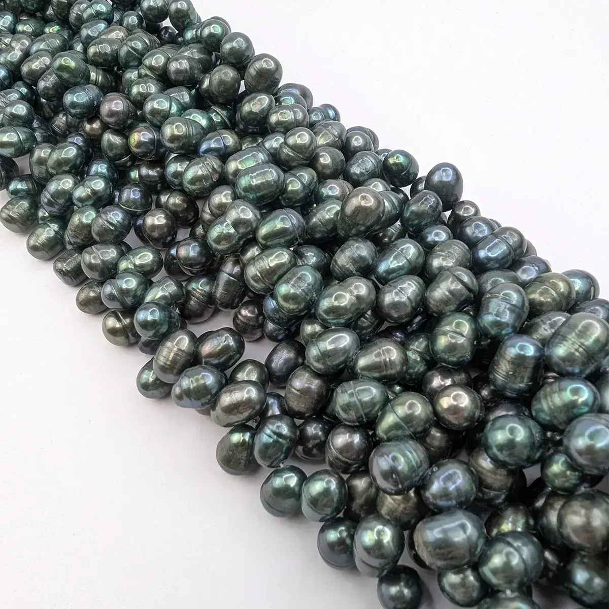 Green Side-Drilled Oval Pearls - Image 3