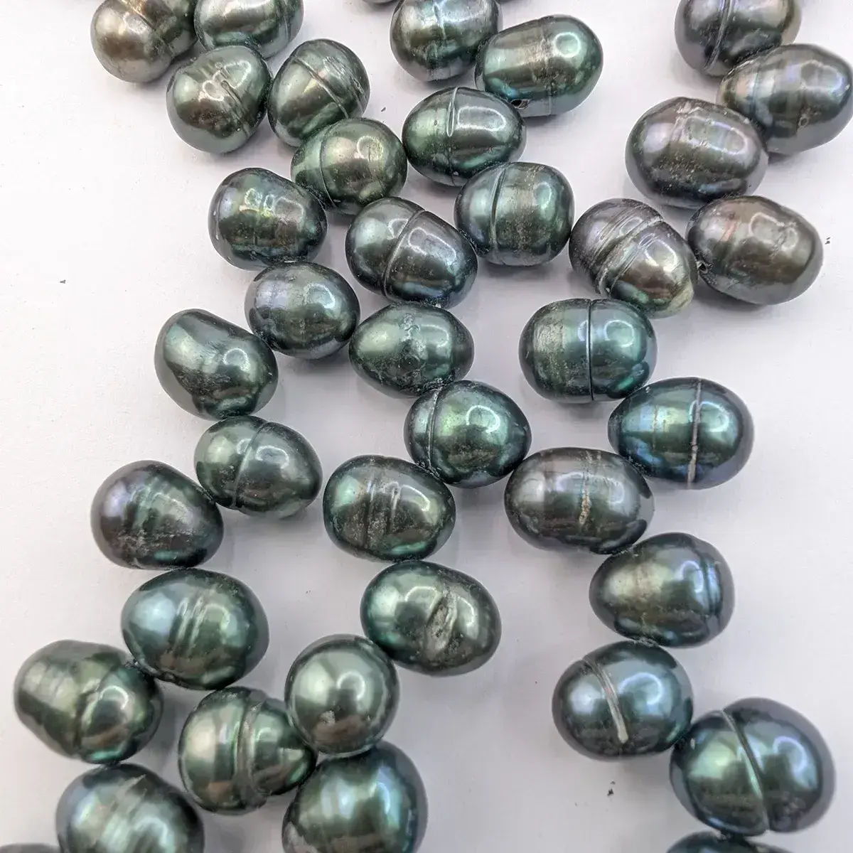 Green Side-Drilled Oval Pearls - Image 4